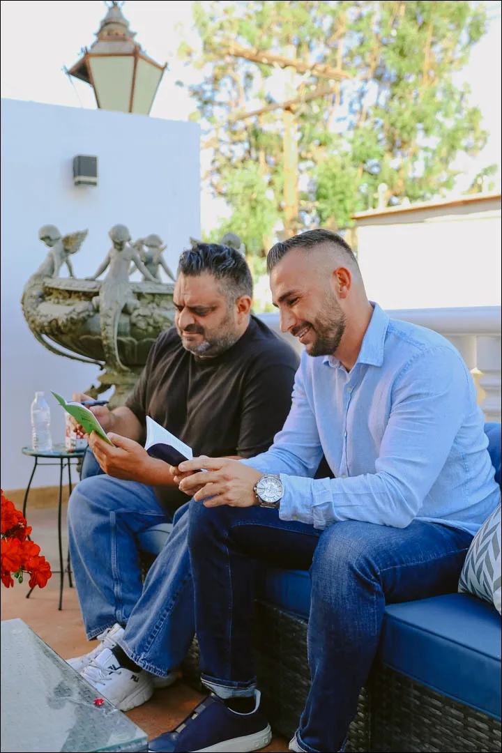 Hollywood Hills Recovery team members reviewing a treatment plan together on the patio